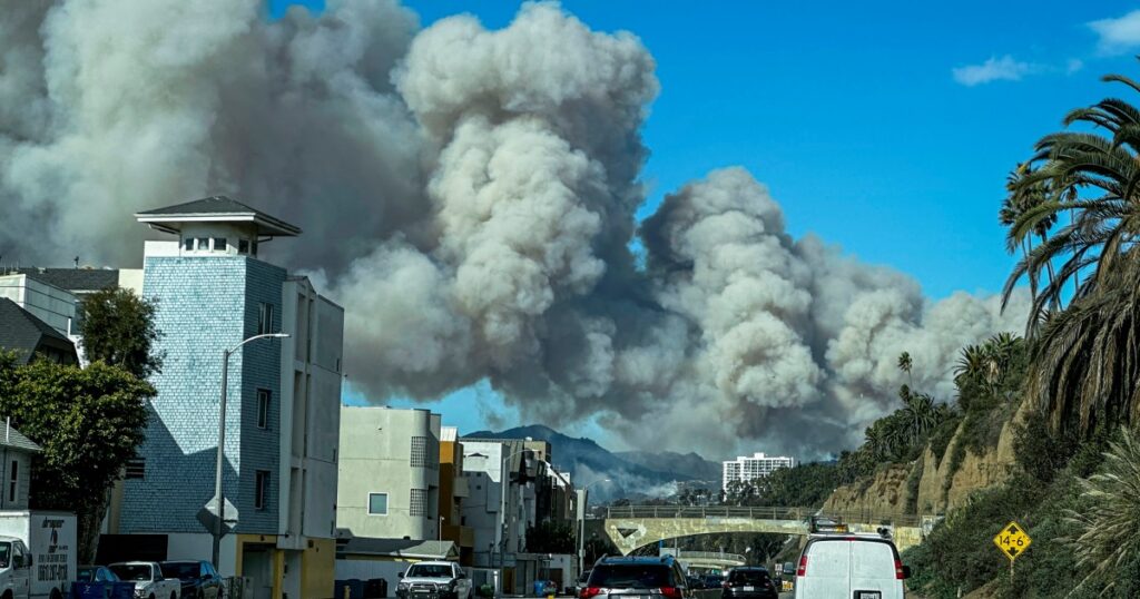 Three fires grow, forcing more than 80,000 evacuations around L.A.